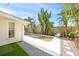 Relaxing pool and patio area with artificial turf at 2426 Icecapade Dr, Sarasota, FL 34240