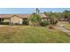 Back exterior view with patio and landscaping at 3001 Seawind Cir # 10C, Venice, FL 34293