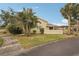 Property exterior showcasing landscaping and building at 3001 Seawind Cir # 10C, Venice, FL 34293