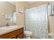 Bathroom with shower/tub combo, vanity, and starfish-themed shower curtain at 318 Star Shell Dr, Apollo Beach, FL 33572