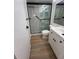 Updated bathroom with modern vanity and shower at 3231 Beneva Rd # 103, Sarasota, FL 34232