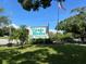 Village Brooke Condominiums sign with landscaping at 3231 Beneva Rd # 103, Sarasota, FL 34232