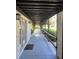 Covered walkway with access to building entrance at 3231 Beneva Rd # 103, Sarasota, FL 34232