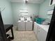 Convenient shared laundry room with multiple washers and dryers at 3231 Beneva Rd # 103, Sarasota, FL 34232