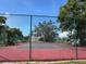 Well-maintained tennis court with chain-link fence at 3231 Beneva Rd # 103, Sarasota, FL 34232