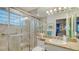 Bathroom with shower, toilet and granite countertop at 3310 Sabal Cove Ln, Longboat Key, FL 34228