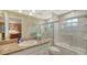 Bathroom with granite countertop, shower and toilet at 3310 Sabal Cove Ln, Longboat Key, FL 34228