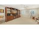 Bonus room with large entertainment center and seating at 3310 Sabal Cove Ln, Longboat Key, FL 34228