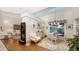Bright dining room with hardwood floors and access to the backyard at 3310 Sabal Cove Ln, Longboat Key, FL 34228