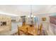 Bright kitchen features a large island, breakfast nook, and updated cabinetry at 3310 Sabal Cove Ln, Longboat Key, FL 34228