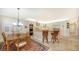 Spacious kitchen with granite countertops, stainless steel appliances, and an island at 3310 Sabal Cove Ln, Longboat Key, FL 34228