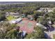 Aerial view showing tennis courts and community buildings at 3333 26Th E Ave # 1173, Bradenton, FL 34208