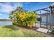 Tropical backyard oasis with a screened pool area at 3431 Chestertown Loop, Bradenton, FL 34211