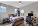 Bedroom with a wooden bed frame and a built-in desk at 3431 Chestertown Loop, Bradenton, FL 34211