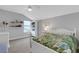 Bright bedroom with a white bed frame and leafy bedding at 3431 Chestertown Loop, Bradenton, FL 34211