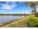 Peaceful lake view with lush green landscaping and homes at 3431 Chestertown Loop, Bradenton, FL 34211
