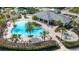 Resort-style pool with cabana and lounge chairs at 3431 Chestertown Loop, Bradenton, FL 34211