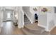 Elegant staircase with wood and carpet accents at 3431 Chestertown Loop, Bradenton, FL 34211