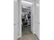 Large walk-in closet with ample shelving and hanging space at 3431 Chestertown Loop, Bradenton, FL 34211