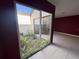 Peaceful courtyard view from inside the house at 3725 Glen Oaks Manor Dr, Sarasota, FL 34232