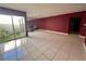 Spacious living room with tiled floors and garden view at 3725 Glen Oaks Manor Dr, Sarasota, FL 34232