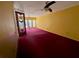 Living area with carpet and French doors at 3725 Glen Oaks Manor Dr, Sarasota, FL 34232