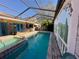 Inviting pool area with spa and covered patio at 3725 Glen Oaks Manor Dr, Sarasota, FL 34232
