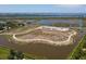 Aerial view showing expansive parkland with nature trails and serene waterfront at 3807 64Th St W, Bradenton, FL 34209