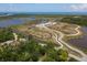 Aerial view of community park with walking trails and waterfront access at 3807 64Th St W, Bradenton, FL 34209