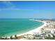 Aerial view of Siesta Key beach, turquoise water, and white sand at 4152 Central Sarasota Pkwy # 727, Sarasota, FL 34238