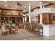 Well-equipped clubhouse kitchen with bar seating at 4152 Central Sarasota Pkwy # 727, Sarasota, FL 34238