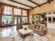 Spacious clubhouse with comfortable seating and high ceilings at 4152 Central Sarasota Pkwy # 727, Sarasota, FL 34238