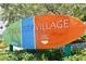 Siesta Key Village community sign, colorful and welcoming at 4152 Central Sarasota Pkwy # 727, Sarasota, FL 34238