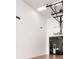 Indoor racquetball court with glass enclosure and hardwood floor at 4152 Central Sarasota Pkwy # 727, Sarasota, FL 34238