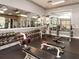 Fitness center weight room with free weights and strength training equipment at 4152 Central Sarasota Pkwy # 727, Sarasota, FL 34238