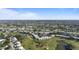 Aerial view of community near golf course and lake at 431 Cerromar Ln # 446, Venice, FL 34293