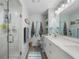 Spa-like bathroom with double vanity and walk-in shower at 431 Cerromar Ln # 446, Venice, FL 34293