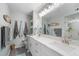 Clean bathroom with double vanity and walk-in shower at 431 Cerromar Ln # 446, Venice, FL 34293