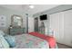 Bedroom with a coastal theme and built-in wardrobe at 431 Cerromar Ln # 446, Venice, FL 34293