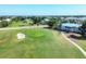 Golf course view with players visible on the green at 431 Cerromar Ln # 446, Venice, FL 34293