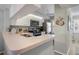 Kitchen with white cabinets and stainless steel appliances at 431 Cerromar Ln # 446, Venice, FL 34293