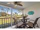 Screened lanai with outdoor furniture and golf course view at 431 Cerromar Ln # 446, Venice, FL 34293