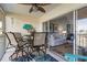 Lanai with seating area, view of living room and golf course at 431 Cerromar Ln # 446, Venice, FL 34293