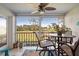 Spacious lanai with golf course view and ceiling fan at 431 Cerromar Ln # 446, Venice, FL 34293