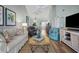 Open living room and dining area with hardwood floor at 431 Cerromar Ln # 446, Venice, FL 34293