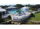 Large community pool with expansive deck and seating at 431 Cerromar Ln # 446, Venice, FL 34293