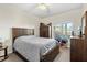 Spacious bedroom with a dresser and window with exterior view at 4802 51St W St # 501, Bradenton, FL 34210