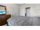 Bedroom with large bed and built-in dresser at 4802 51St W St # 501, Bradenton, FL 34210