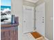 Bright and airy entryway with double door entry and coat rack at 4802 51St W St # 501, Bradenton, FL 34210