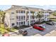 Three-story building with multiple units and parking at 4802 51St W St # 501, Bradenton, FL 34210
